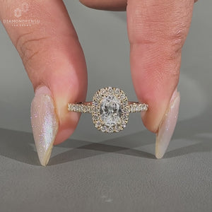 Yellow gold oval engagement ring for her.
