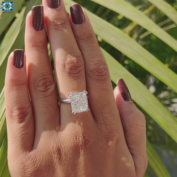 Cushion cut solitaire set for timeless elegance.
