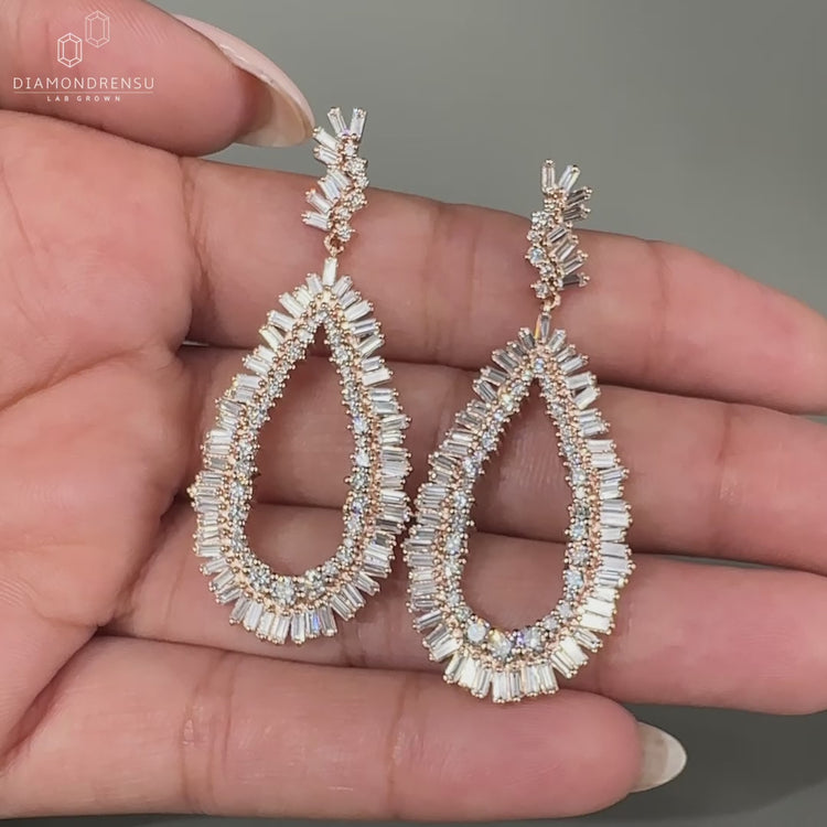 Long dangle earrings with baguette and round diamonds
