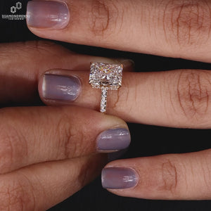 Model wearing a radiant cut engagement ring with lab-grown diamond and pave diamond band, handmade by Diamondrensu