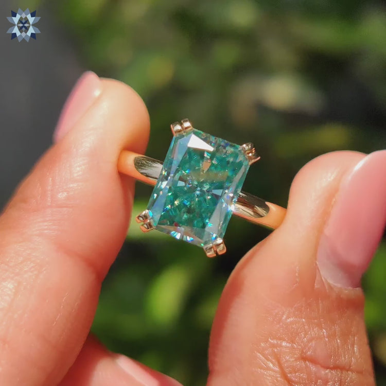 Radiant cut moissanite ring with a stunning handcrafted touch.
