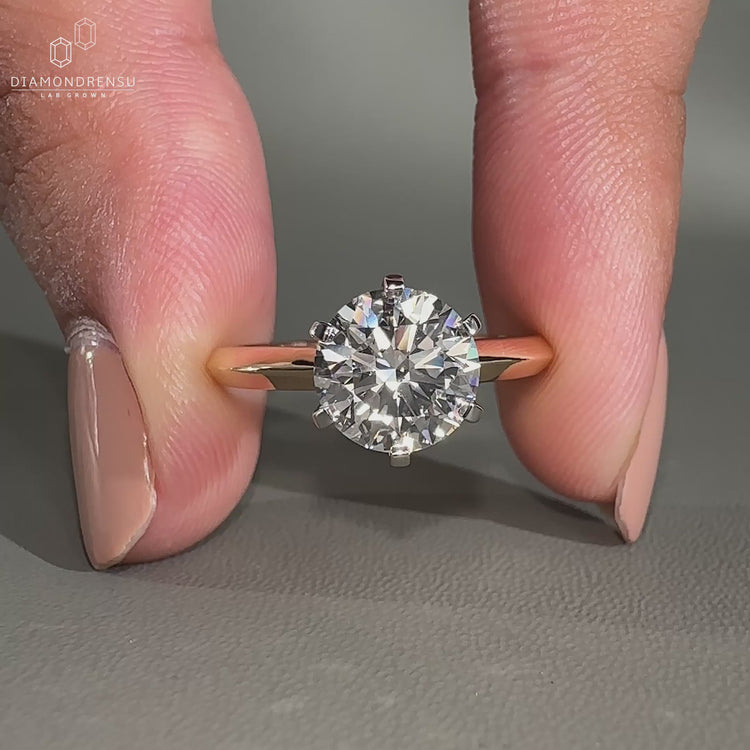 Classic solitaire ring with a sleek design.
