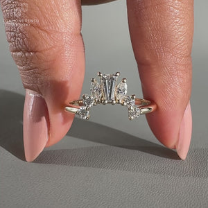 Tapered baguette wedding band with elegant edges.
