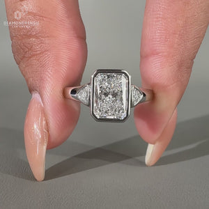 3 Stone Engagement Ring with stunning bezel setting.