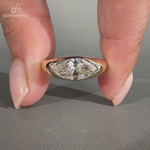 Marquise Cut Engagement Ring in Gypsy Setting
