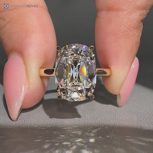 Cushion old mine cut ring in a solitaire style.