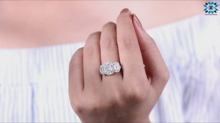 3 stone halo setting showcasing brilliant stones.
