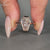 Lab grown coffin diamond ring with cathedral setting design.