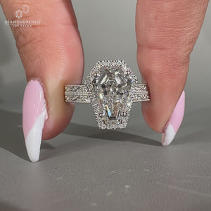 Handmade coffin cut engagement ring with milgrain details and engraved filigree.