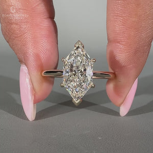 Dutch marquise diamond ring with a hidden halo design.
