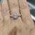 1.61 TCW Pear-Cut Halo Twist Pave Moissanite Engagement Ring