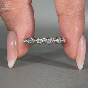 Bezel set wedding band crafted for a modern look.
