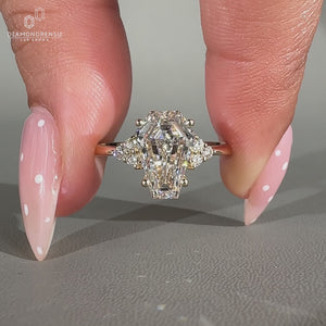 Lab grown coffin diamond ring with muse setting and tapered shank.
