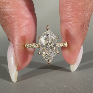 Dutch marquise ring set in yellow gold, offering a unique and sophisticated design.
