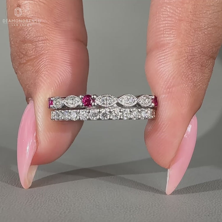 Round diamond wedding band with a sleek design in white gold.
