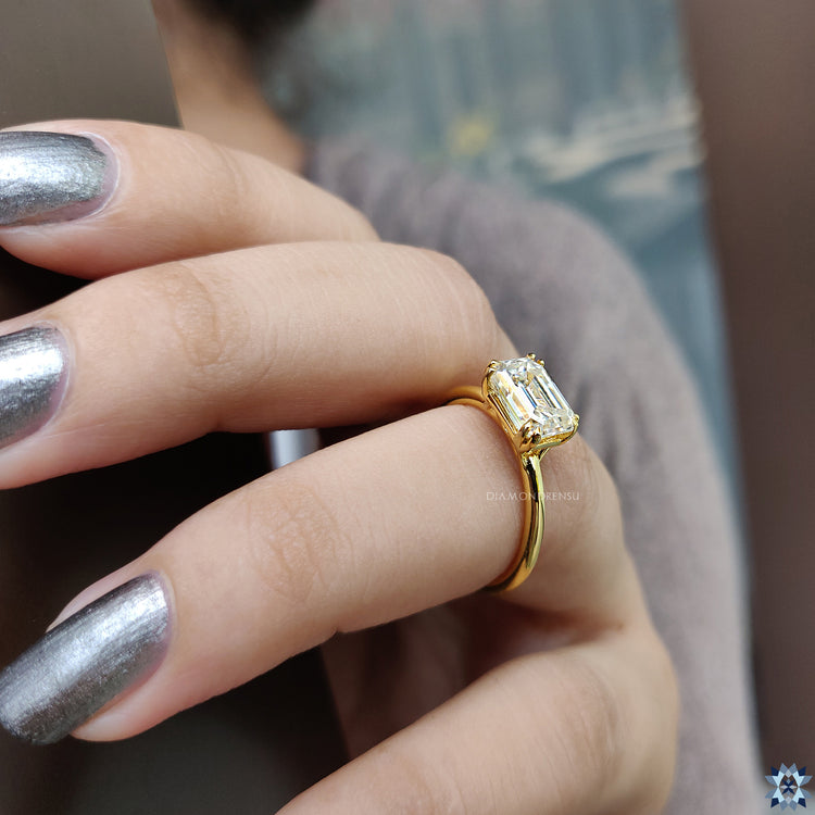 East to West Trellis 2.00 CT Emerald Solitaire Moissanite Engagement Ring