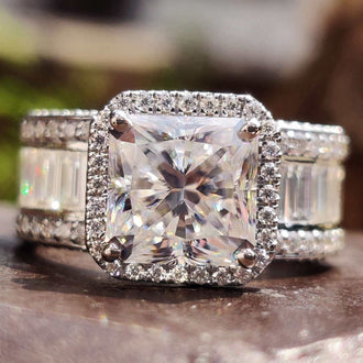 Radiant cut moissanite ring with a stunning halo design
