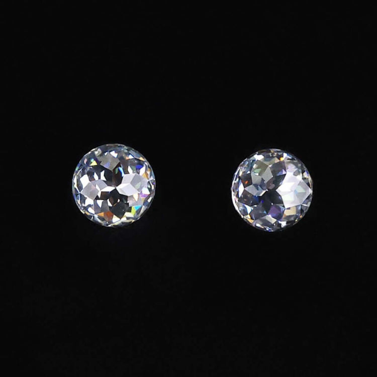 Pair of round rose cut moissanite stones with total carat weight from 0.50 to 4.0.
