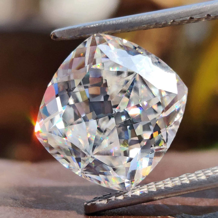 Cushion cut moissanite shines near cushion divine cut moissanite.
