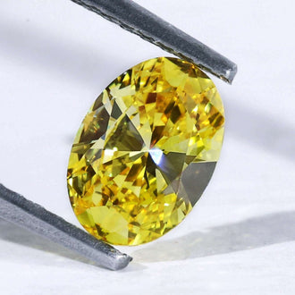 Yellow lab grown diamond oval cut 0.70 carat loose stone.
