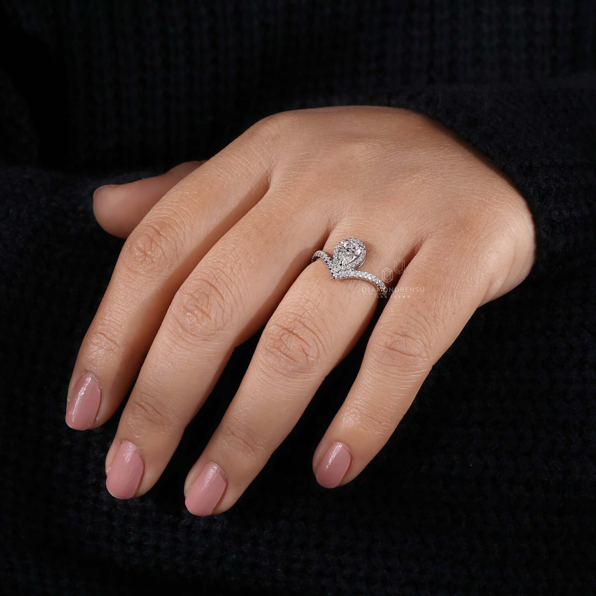 pear halo engagement ring