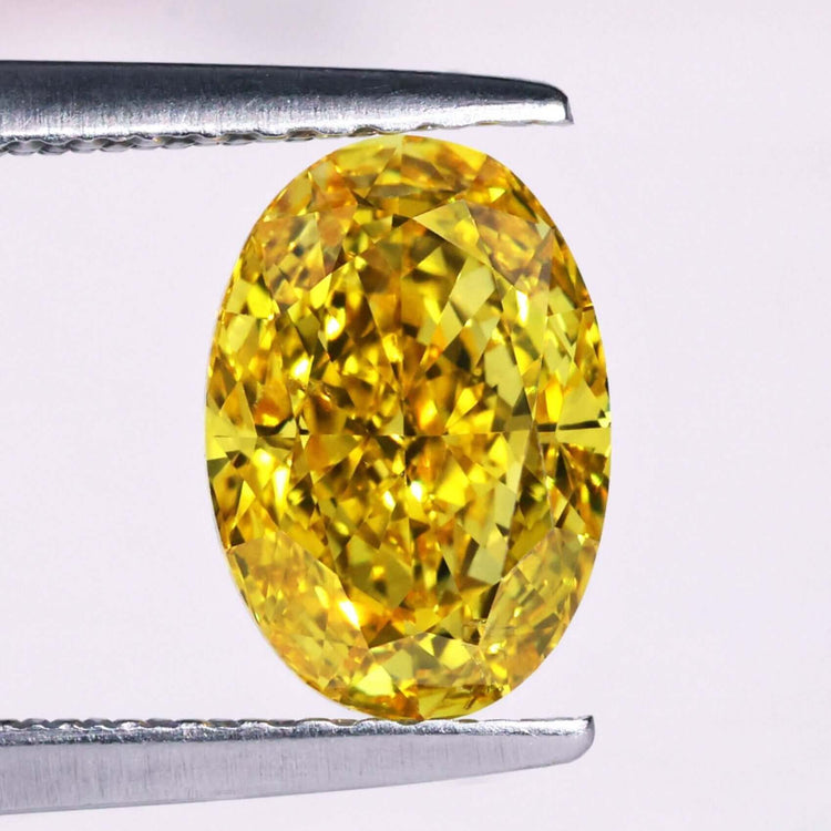 Oval yellow diamond 1 carat loose stone.
