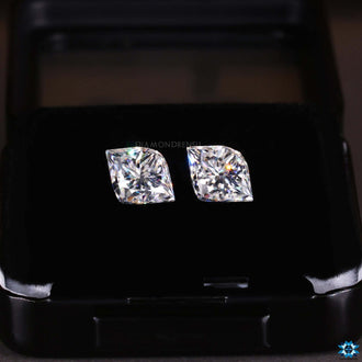 Antique cut stone pair with unique flame shape.
