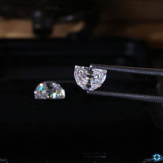 Loose moissanite styled as Half Moon Step Cut with Pair Of Stones option.
