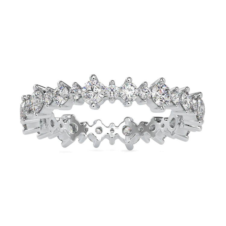 Lab grown eternity band with round cut diamond and floating bubble design.
