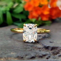 A stunning elongated cushion engagement ring with a modern design.
