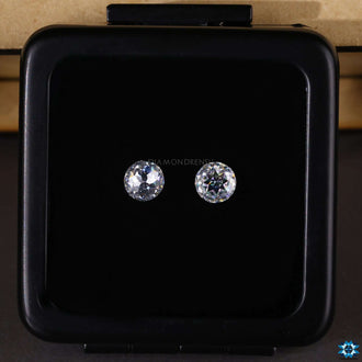 Diamondrensu offers a pair of round rose cut moissanite stones ideal for custom jewelry.

