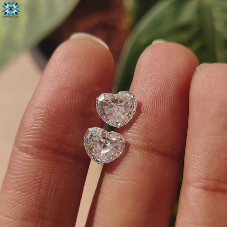 Heart-shaped loose moissanite pair for jewelry lovers.