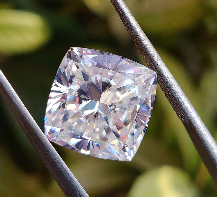 5.18 carat moissanite cushion cut loose stone in a colorless grade, ideal for custom jewelry.
