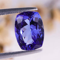 Cushion Tanzanite Birthstone with 1.54 carat weight shown as a loose gemstones option for December gem stone lovers.
