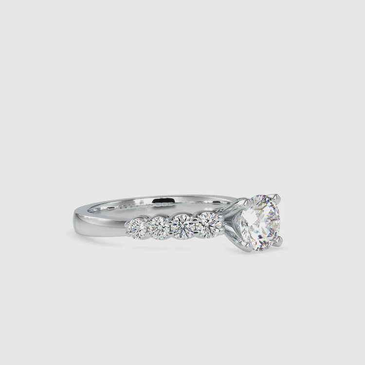 Stunning pave setting with a round diamond for a timeless engagement ring.