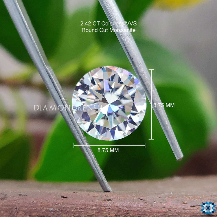 Diamondresnu Round Heart and Arrows Cut Moissanite shown in loose form.
