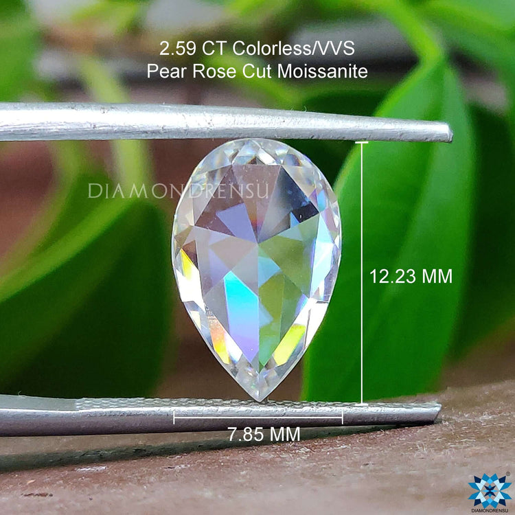 Loose moissanite stone used in heirloom ring featuring Pear Rose Cut moissanite by diamondrensu.
