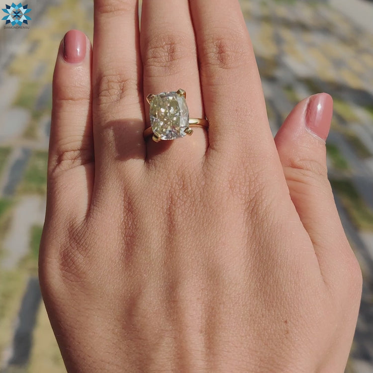 Elongated cushion cut moissanite engagement ring featuring brilliant sparkle.
