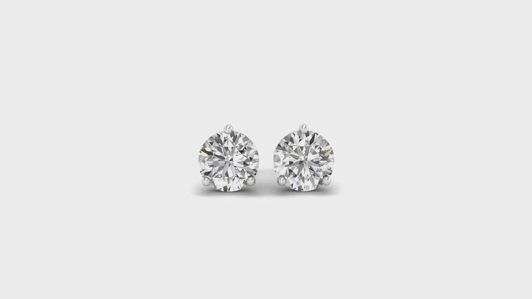 Timeless round diamond stud earrings in a 3 prong setting, perfect for everyday wear.
