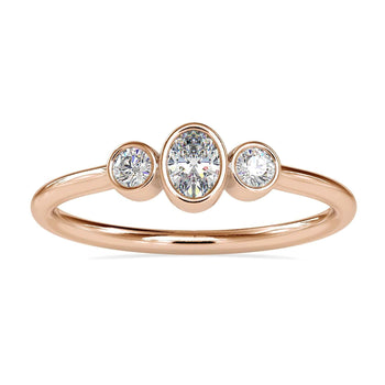 Bezel set engagement ring featuring a 2 carat oval diamond in white gold
