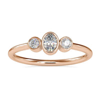 Bezel set engagement ring featuring a 2 carat oval diamond in white gold
