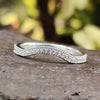 curved moissanite band