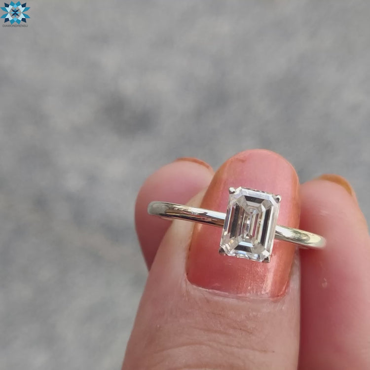 Stunning emerald cut ring with timeless charm and sparkle.