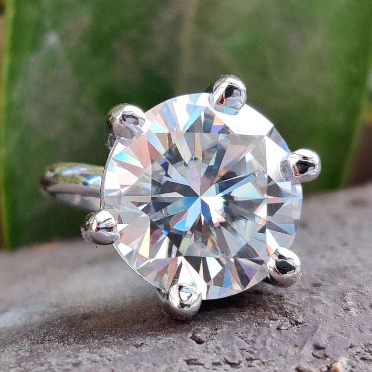 Round engagement ring with timeless brilliance.
