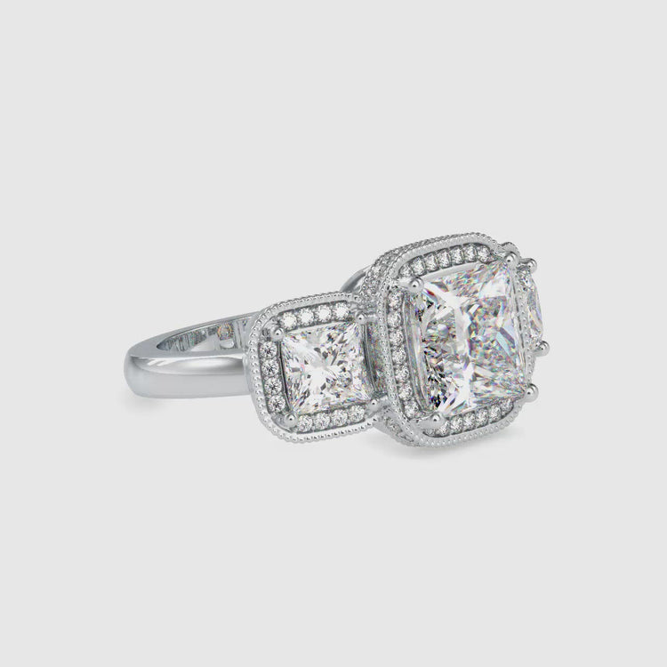 Princess cut diamond ring with a halo and prong setting

