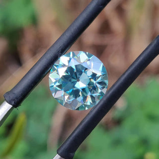 Green Moissanite available in round old european cut moissanite style.
