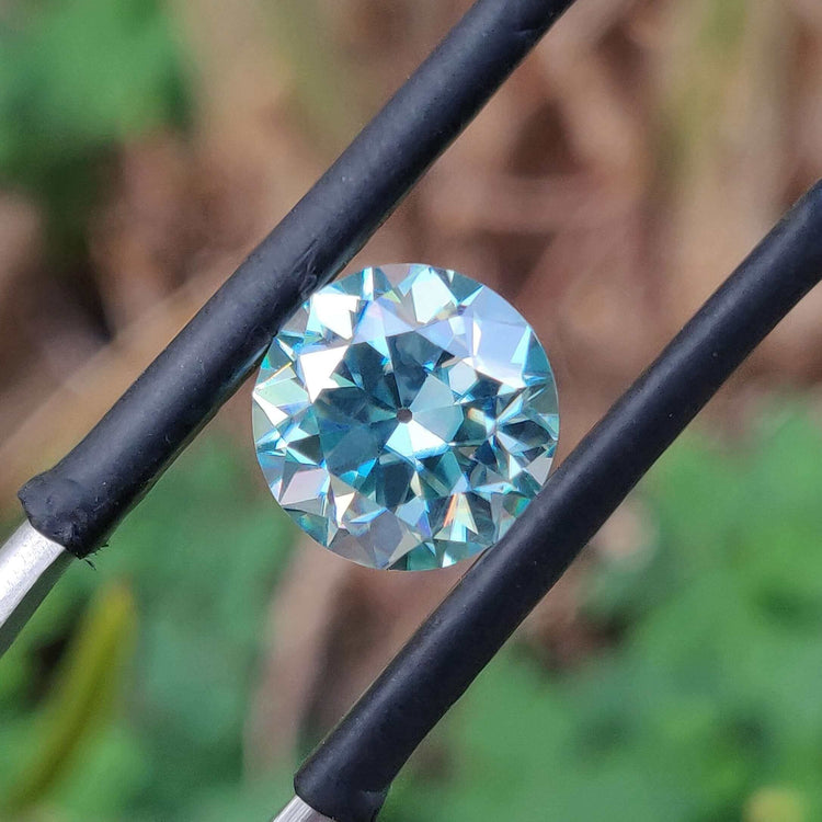 Green Moissanite available in round old european cut moissanite style.
