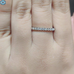 Round cut wedding band with elegant and classic appeal.