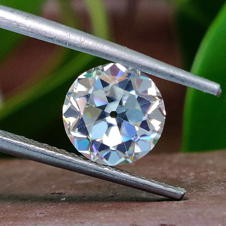 Round Old European Cut shown as a loose moissanite from Diamondresnu.
