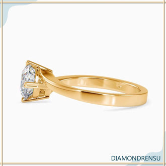 Bypass diamond ring with a round solitaire diamond for timeless beauty.